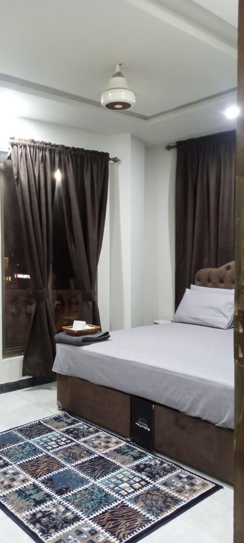 Northern Suites Bahria Town Равалпінді Номер фото
